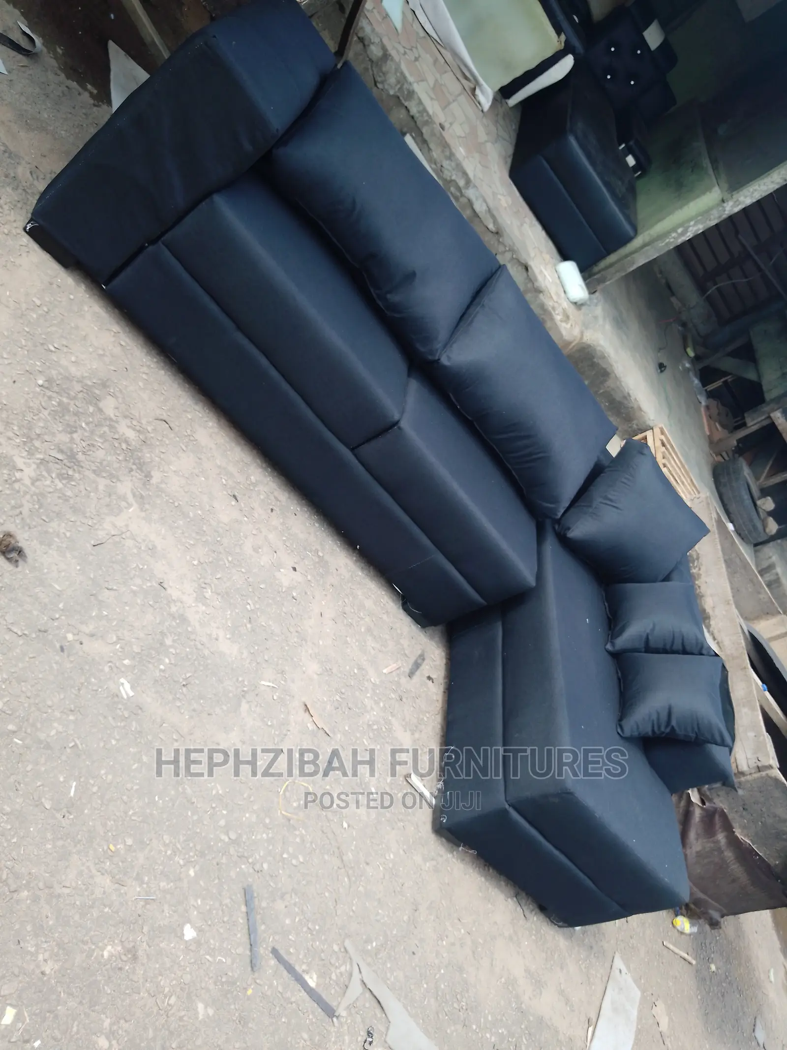 L Shaped Black Pillow Back Sofa