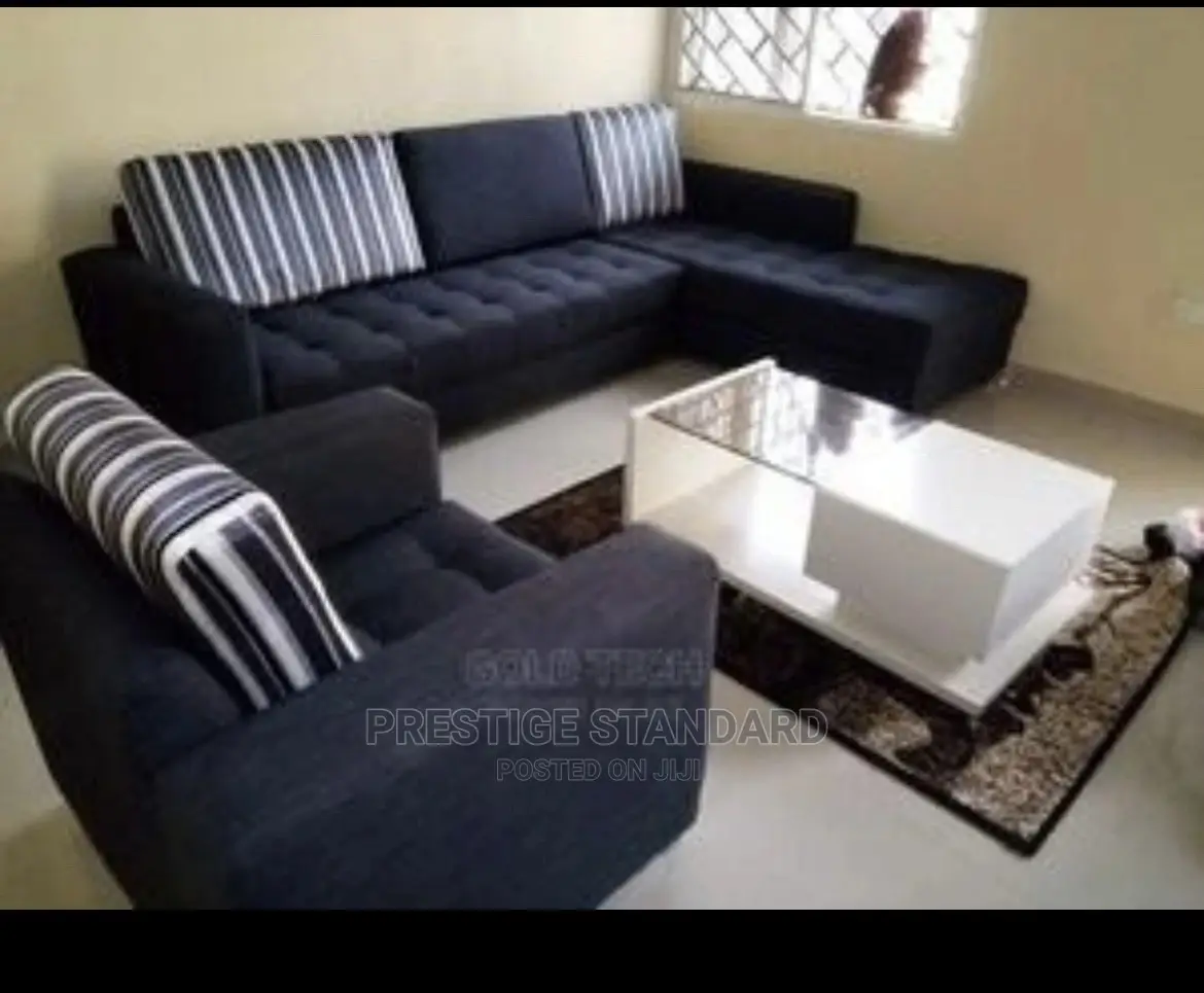 A Standard 7 Seater Sofa With a Center Table