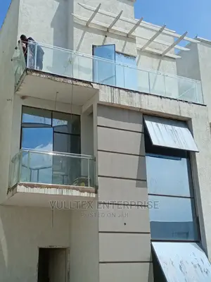 Reflective Glass Frameless Window