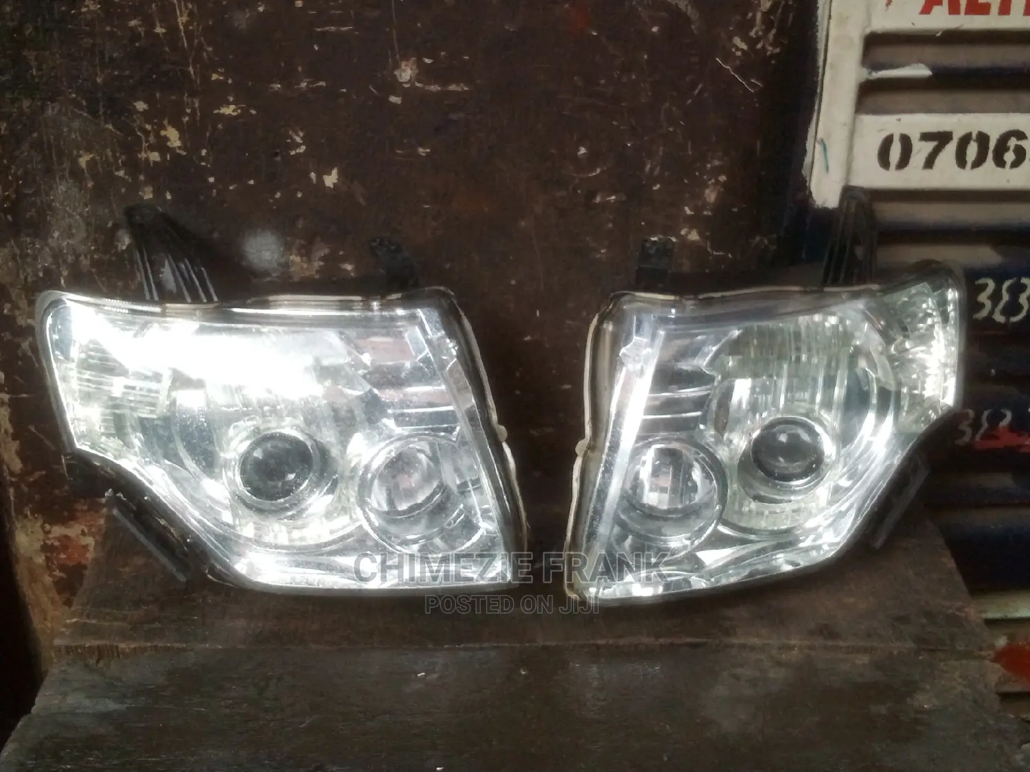 Head Light Mitsubishi Pajero