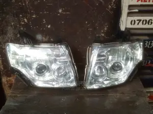 Head Light Mitsubishi Pajero