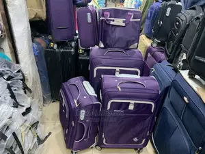 Set of 4 Purple Swiss Polo Traveling Luggage