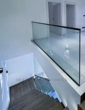 Indoor Tempered Glass Balustrade With Matt Black Steel.
