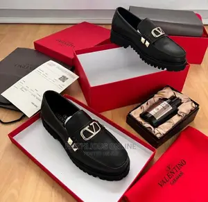 Photo - Valintino and Louis Vuitton Shoe