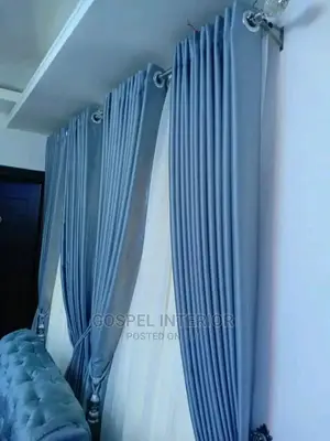 Curtains and Window Blinds With Bed Sheets Are Available