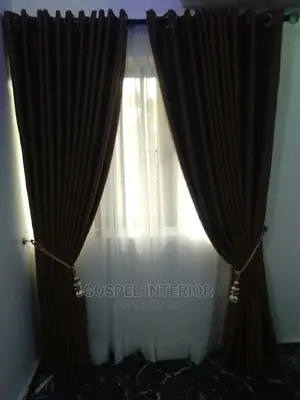 Curtains and Window Blinds With Bed Sheets Are Available