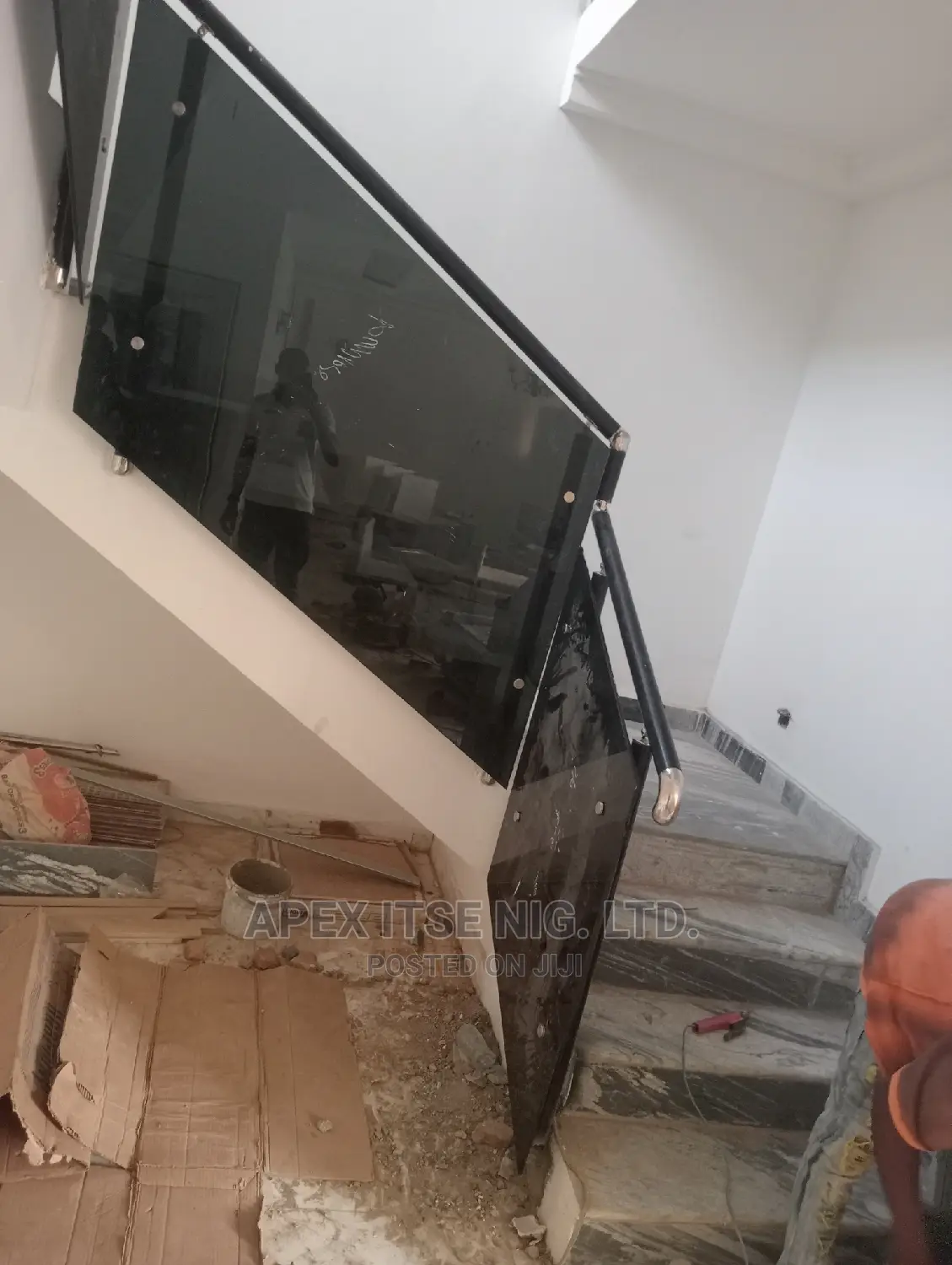 Black Pipe With Grey Glass Staircase