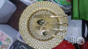 Unique Golden Dozens Cultlery Set And Single Charger Plate