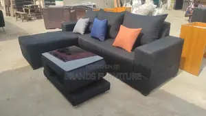Photo - Black Lshape Troll Pillows N Center Table