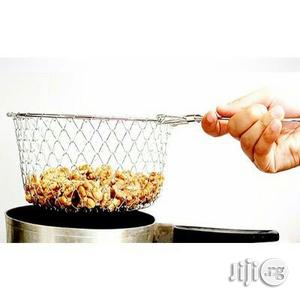 Non Stick Frying Pan And Stimmer.
