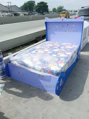 A Standard 4ft by 6ft Children Bedframe With Mattress
