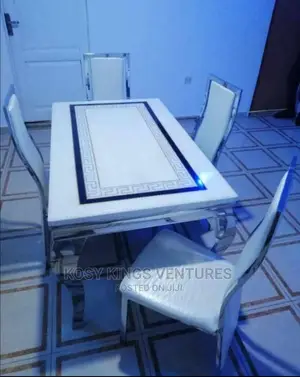 Versace Marble Dinning Set With Four Leather Chairs