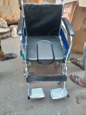 Wheelchair With Comode