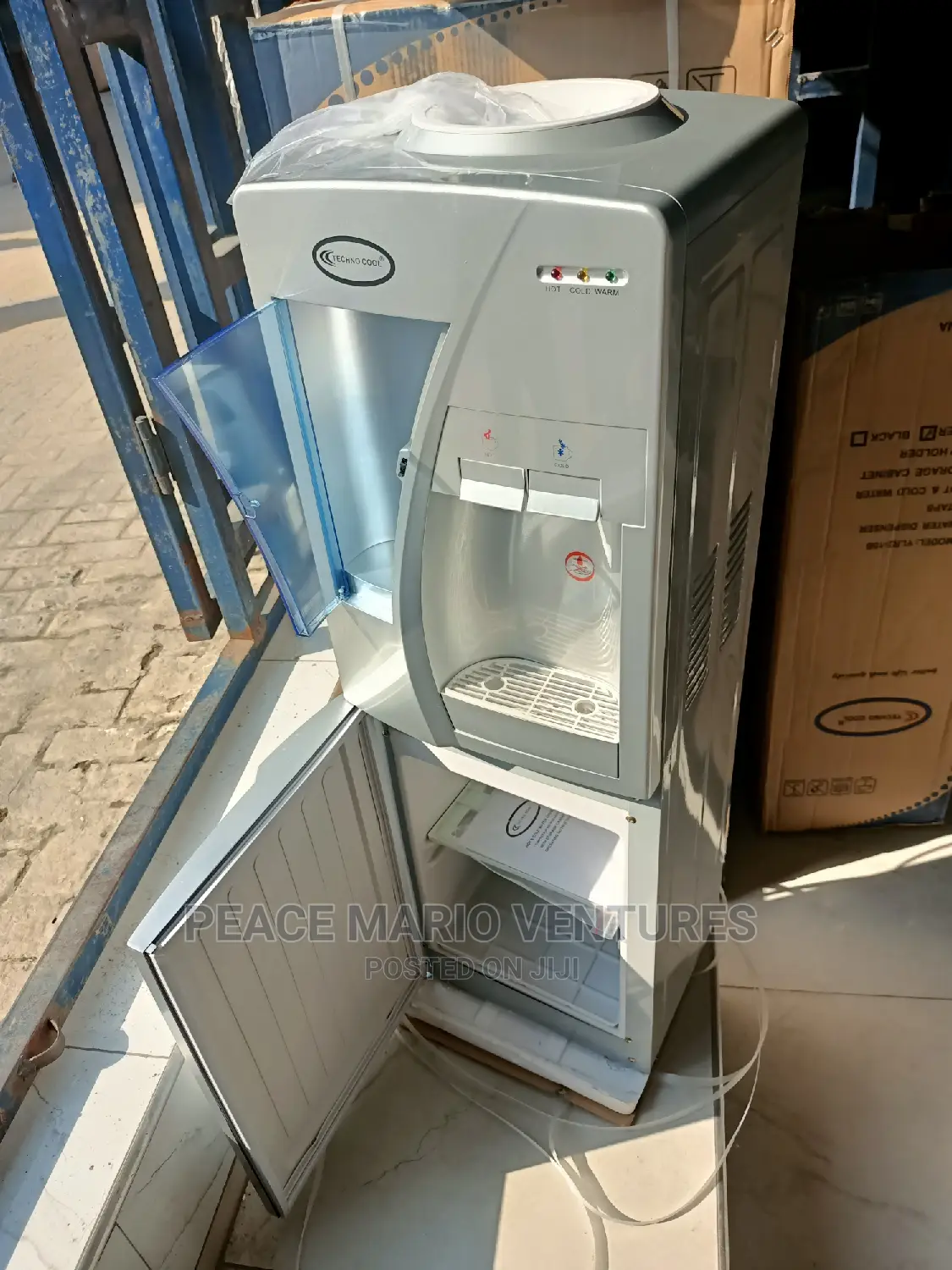 Technocool Hot and Cold Water Dispenser With Cupholder/ Wnty