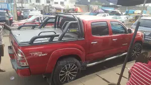 Rugged Spoiler Tacoma and Rolling Cover