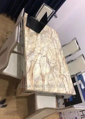 Modern 6 Seater Marble Top Padded Dining Table.