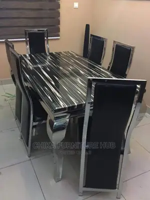 Modern 6 Seater Marble Top Padded Dining Table.