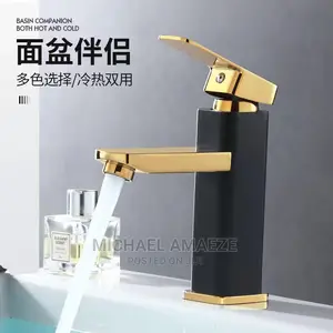 Black and Gold Basin Mixer Tap