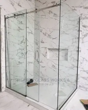Shower Enclosure With Silver Chrome Accessories