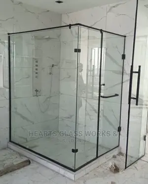Shower Enclosure Installed With Matt Black Accessories.