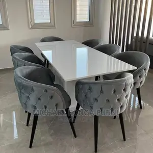 Luxurious 8 Seater Marble Top Dinning Set.