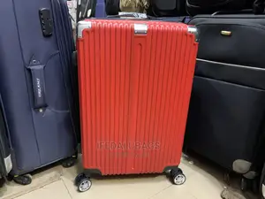Medium Size Red Plastic Traveling Luggage
