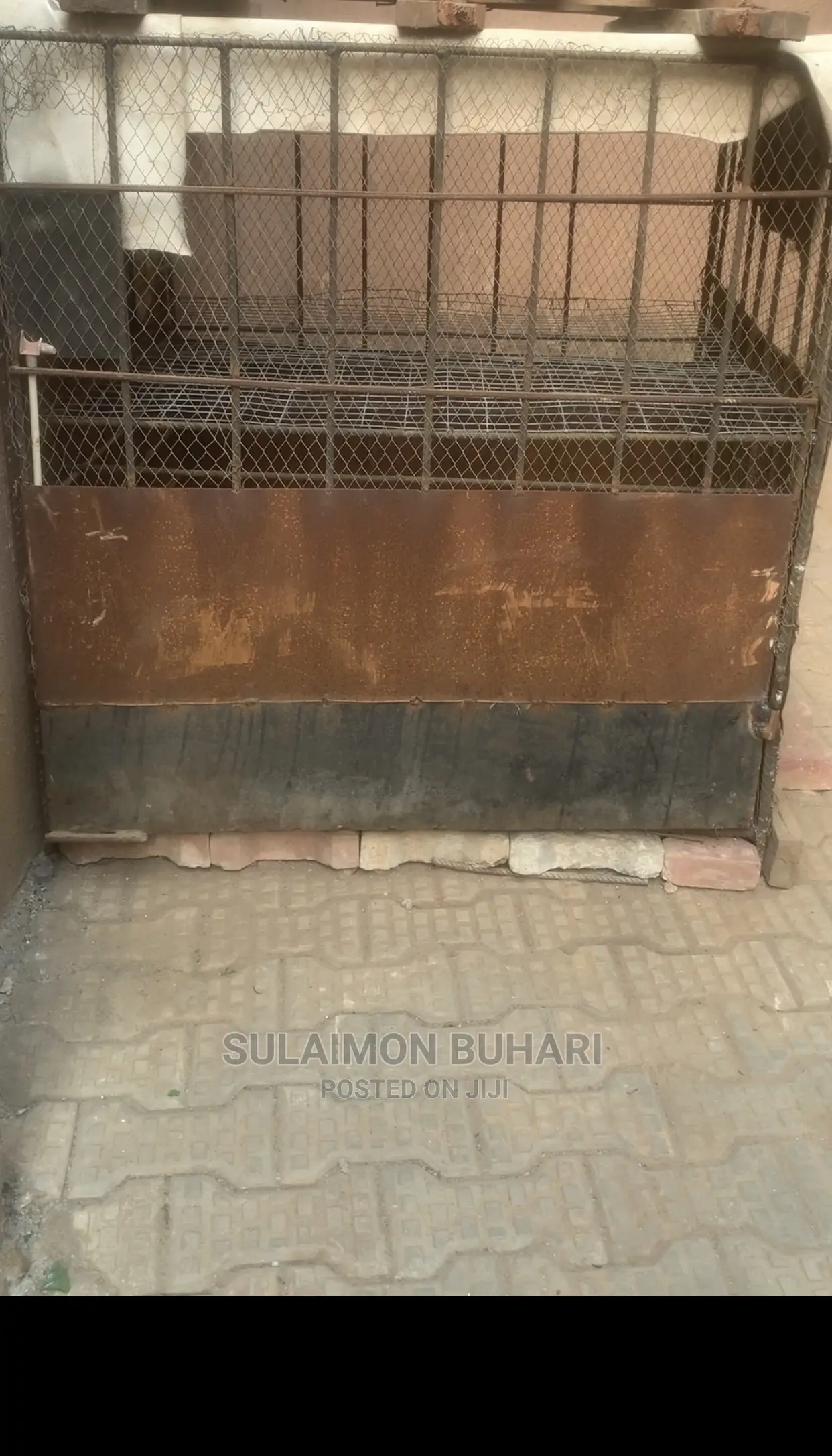 An Iron Rod Standard Cage For Rearing Of Dogs And Chicken.