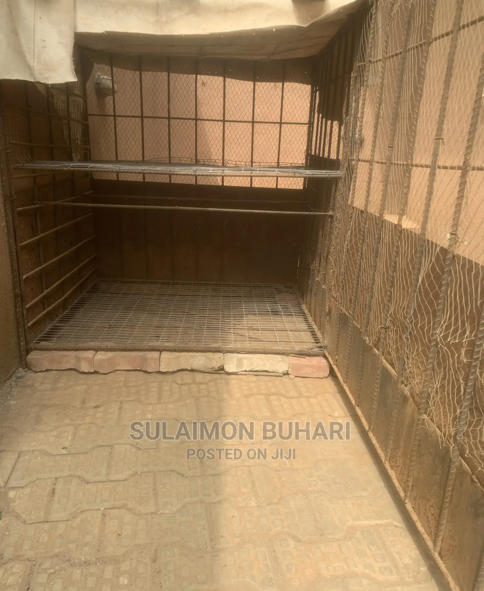 An Iron Rod Standard Cage For Rearing Of Dogs And Chicken.