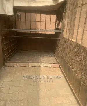 An Iron Rod Standard Cage For Rearing Of Dogs And Chicken.