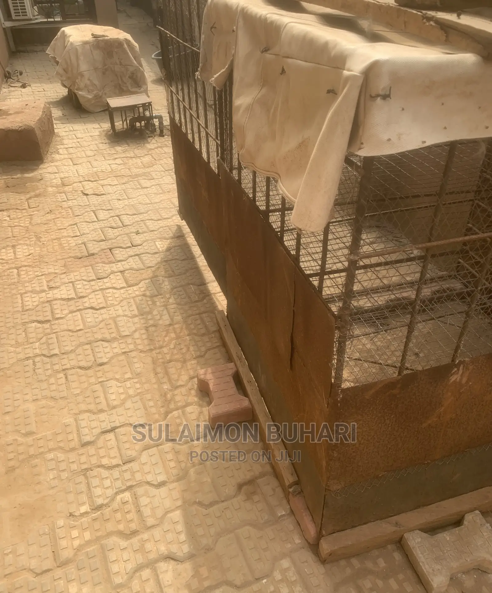 An Iron Rod Standard Cage For Rearing Of Dogs And Chicken.