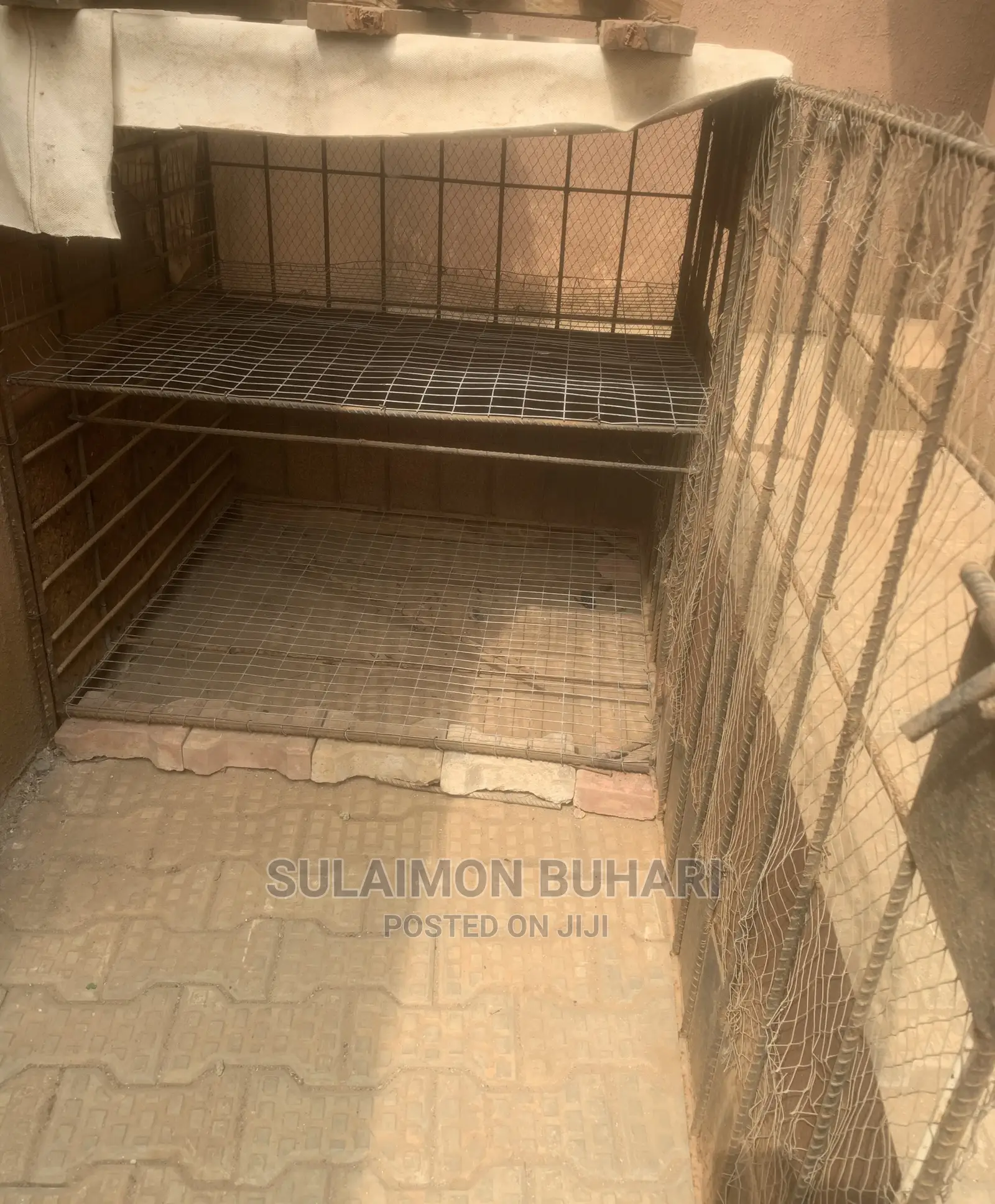 An Iron Rod Standard Cage For Rearing Of Dogs And Chicken.