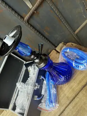Smoking Shisha Pot With Pipes