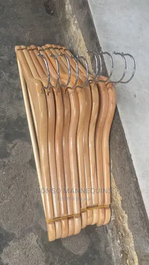 Photo - Bundles of Wooden Hangerz for Clothing Display