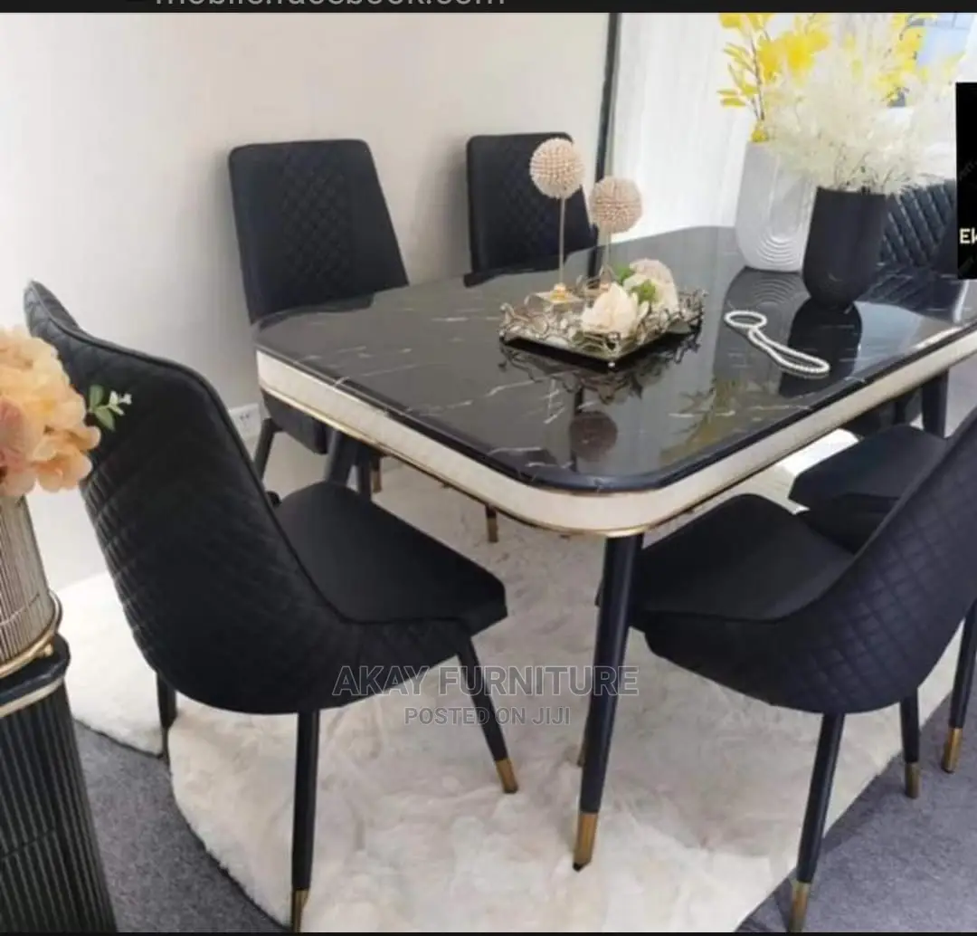 Dinning Table and Chairs by 6