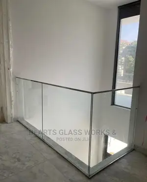 10mm Clear Tempered Glass With Silver Handrails.