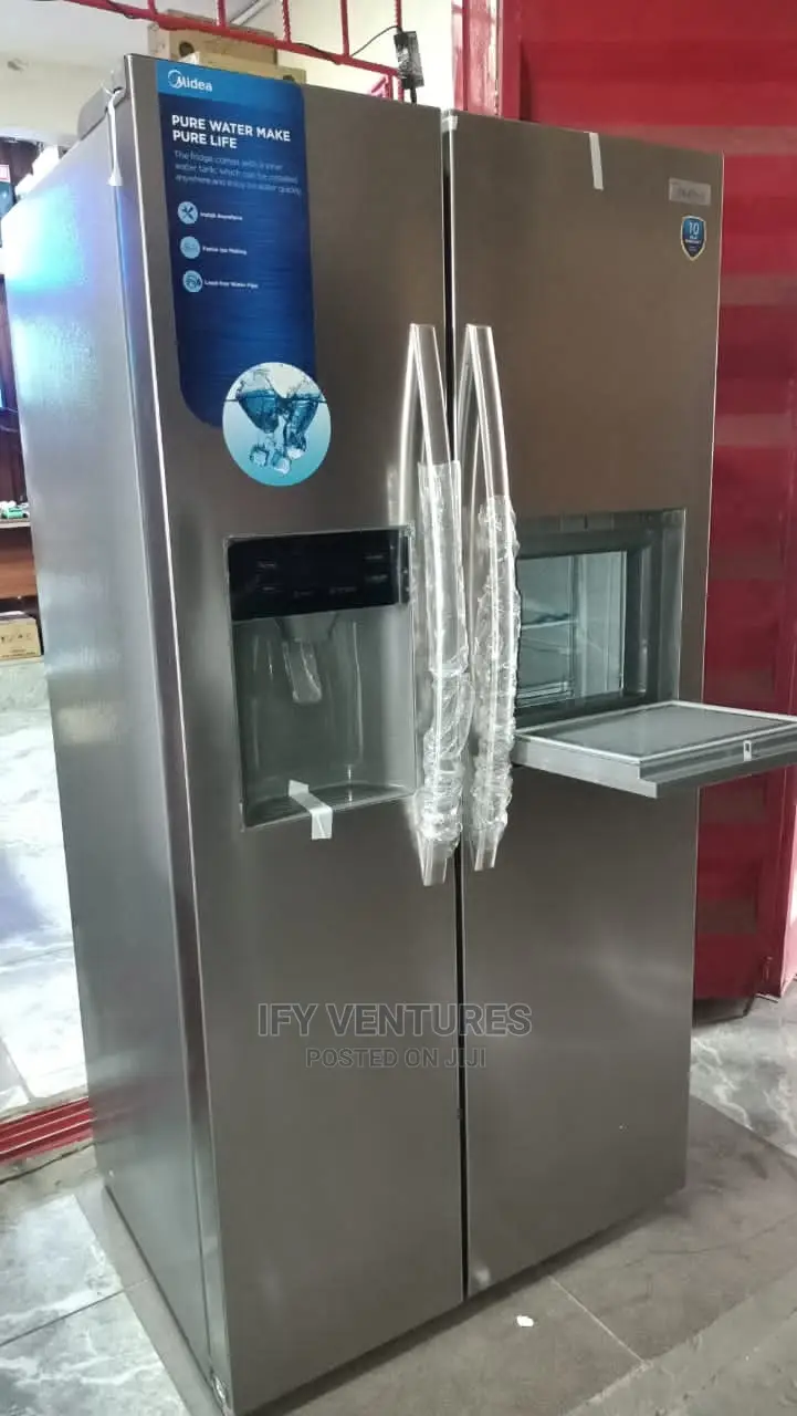 Midea Side by Side Refridgerator With Dispernser.Silver Colo