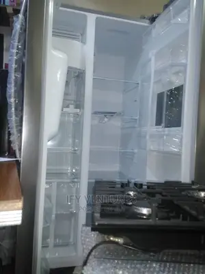Midea Side by Side Refridgerator With Dispernser.Silver Colo