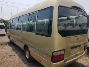 Photo - Toyota Coaster 2015 Gold