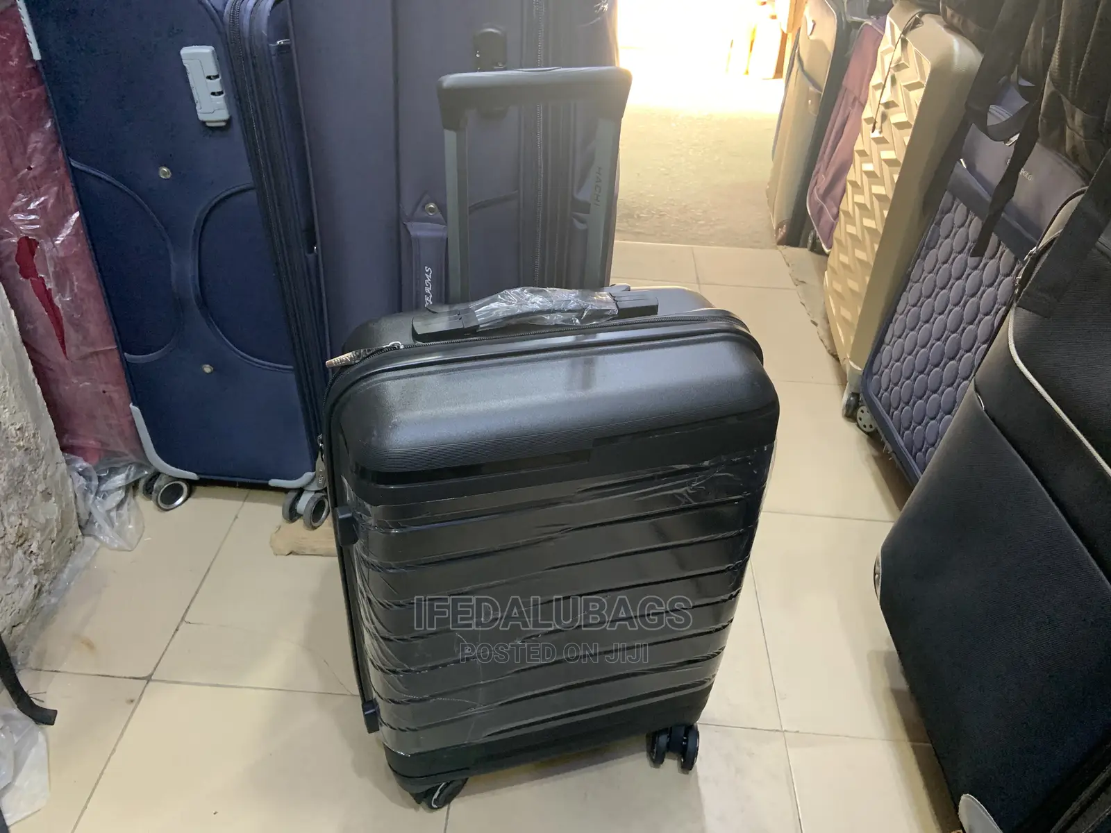 Small Quality Imported Black Plastic Traveling Luggage