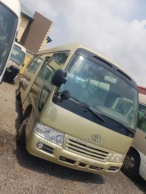 Toyota Coaster 2015 Gold