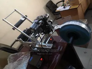 Round Bottle Sticker Labeling Machine.
