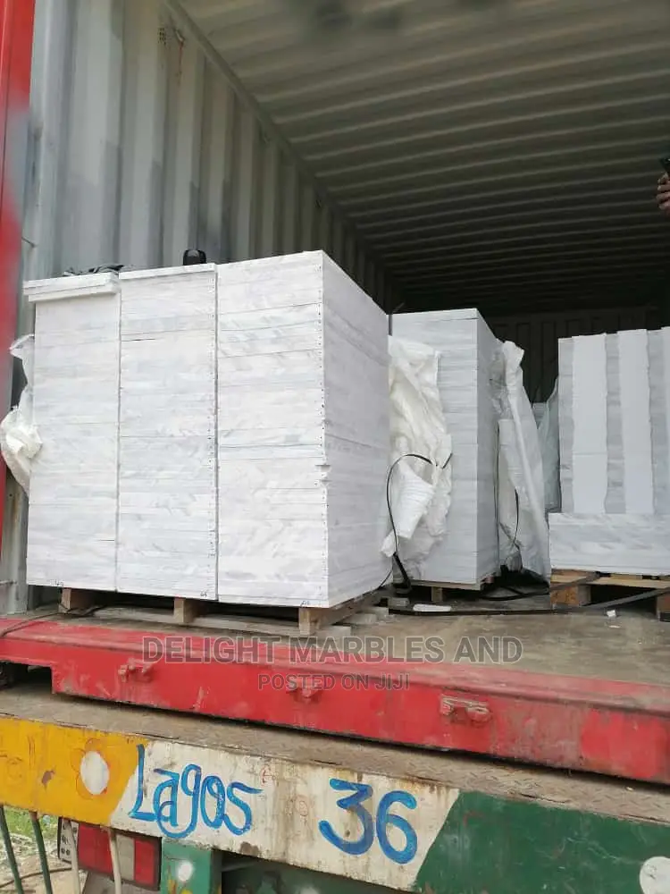 Carrara Tiles.