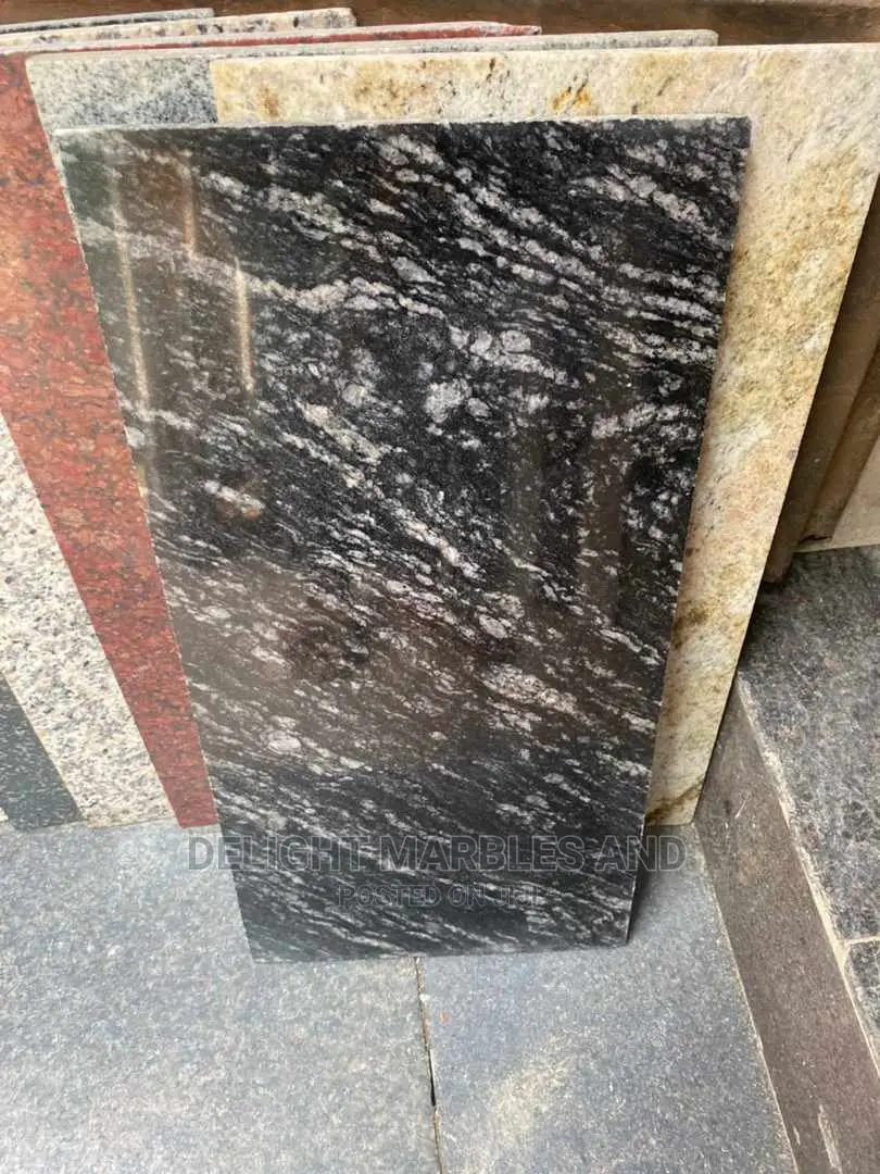Carrara Tiles.