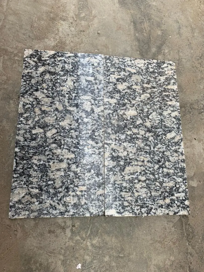 Carrara Tiles.