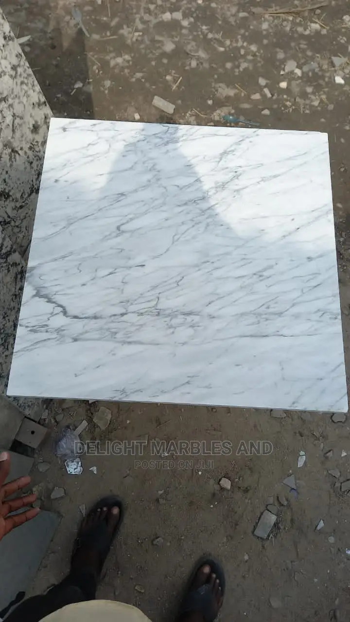 Carrara Tiles.