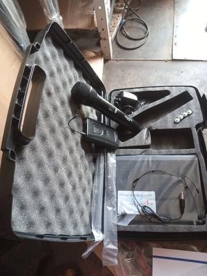 Magnetic Lavaliere and Overhead Mic.