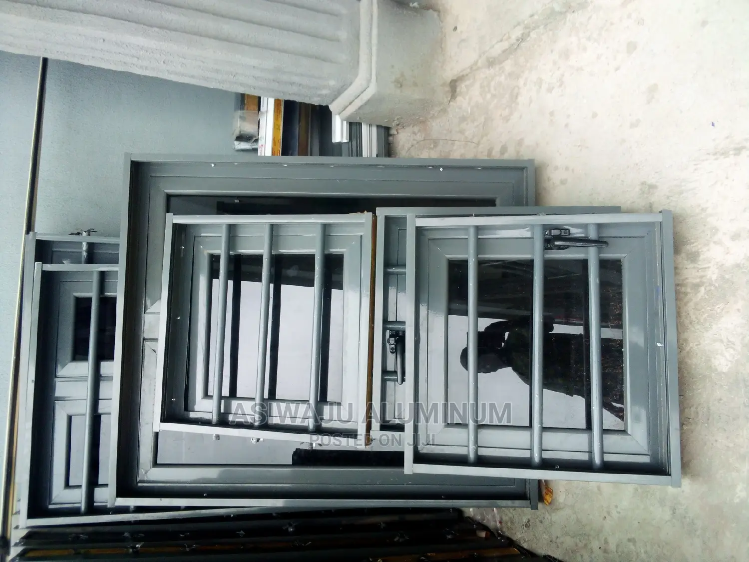 Grey Aluminum Windows With Burglary