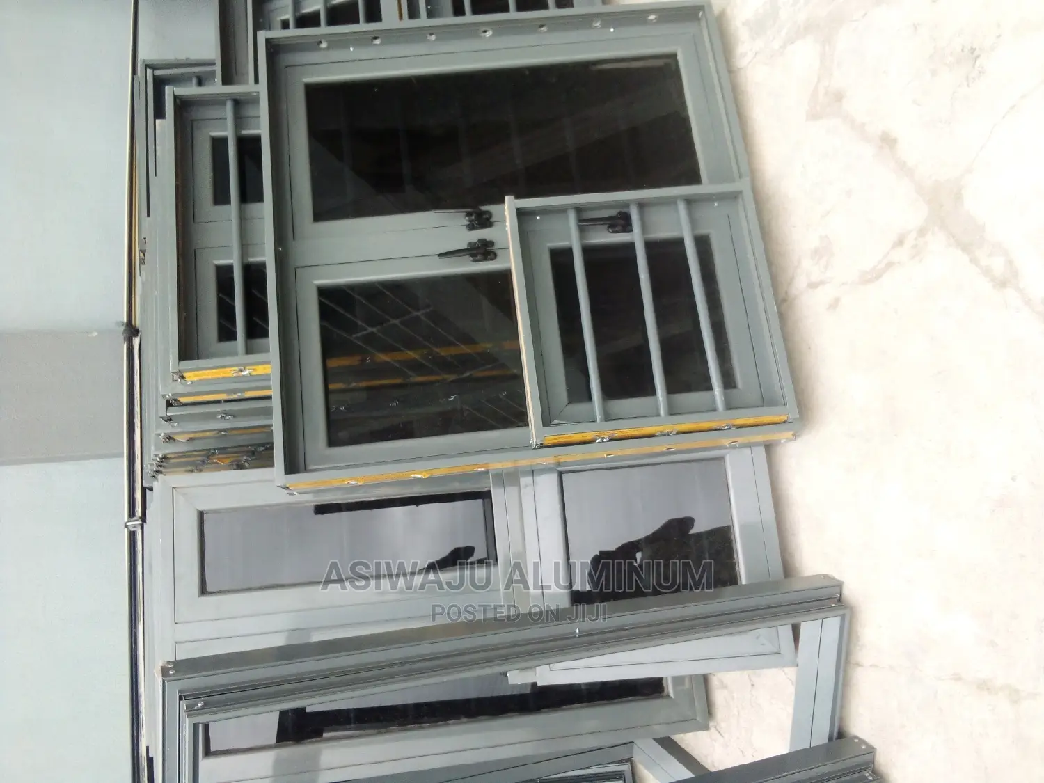 Grey Aluminum Windows With Burglary