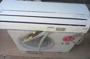 1.5hp LG Ac Very Clean With Gas and 6 Month Warranty