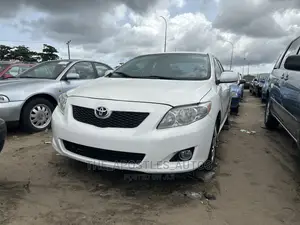 Toyota Corolla LE 4dr Sedan (1.8L 4cyl 4A) 2010 White